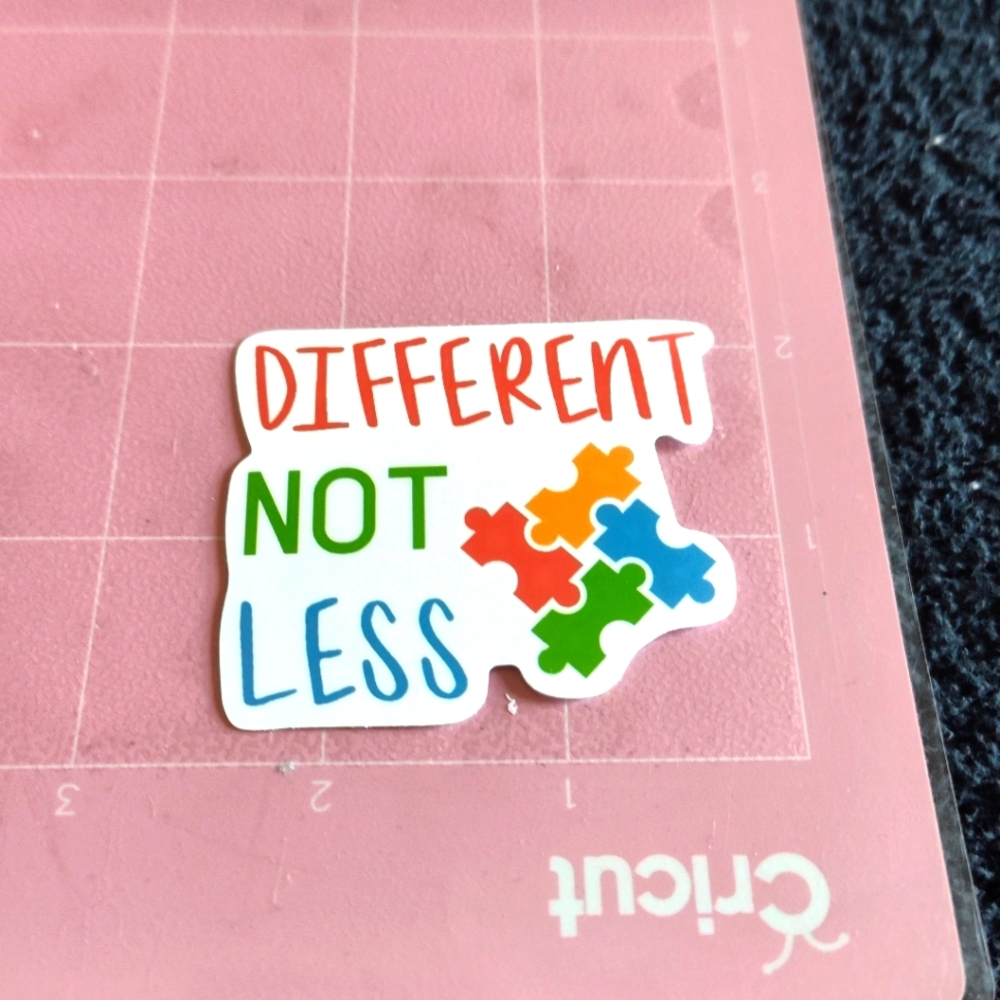 💙 Colorful Different Not Less Autism Awareness Puzzle Piece Sticker